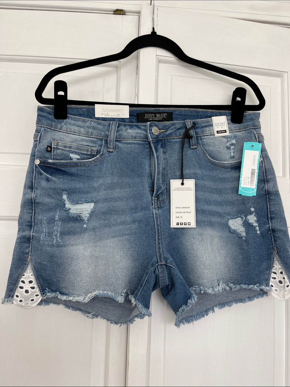 Judy Blue Light Wash Distressed Denim Shorts with Eyelet Side Trim